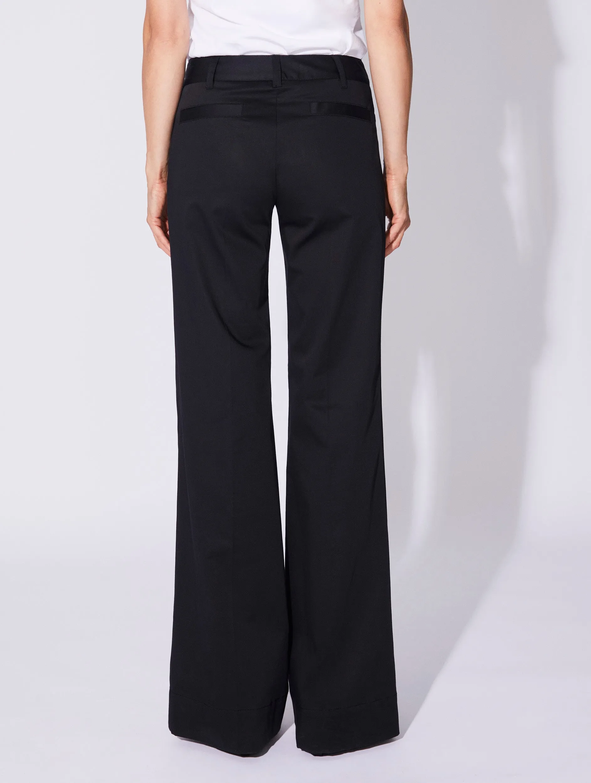 Black stretch cotton satin flared trousers